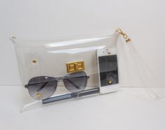 It is very nice design .Each bag is hand cut and carefully to make it by Hand. 100 % handmade .It is very nice clutch, purse for your party and every day. It is a see through bag .Easy to find everything in your bag. **You can select the color and material Nickel or gold color of accessory** -Material: Made by Clear Vinyl in High Quality and Very good accessory. -Country of Origin: Made in Thailand -Size Approx. W 15 x L 24 x D 2.5 cm. ( Medium Size) (W6xL9 1/2 xD1) -The Length of the s... Transparent Purse, Transparent Clutch, Clear Stadium Bag, Clear Clutch, Clear Purses, Transparent Bag, Best Pens, Clear Bags, Pencil Bags