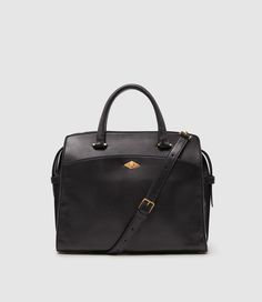 A slimmer version of our signature Private Eye. Its narrower width allows for a more compact day bag that still fits all of your essentials, while maintaining the Private Eye’s timeless exterior. It is the perfect bag for both day and evening, and features an adjustable crossbody strap for added versatility. Fits a 13” laptop. Elegant Crossbody Briefcase For Daily Use, Sleek Satchel With Detachable Handle For Everyday, Timeless Everyday Briefcase With Detachable Strap, Elegant Briefcase With Adjustable Strap For Daily Use, Luxury Briefcase With Detachable Strap For Everyday Use, Timeless Briefcase With Detachable Strap For Everyday, Timeless Formal Bag With Adjustable Handle, Sleek Formal Bags With Detachable Strap, Timeless Formal Bags With Adjustable Handle