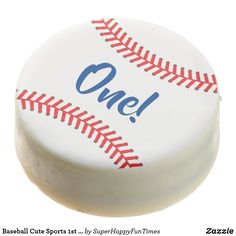 a close up of a baseball on a white surface with the word one painted on it