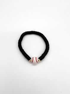 "This listing is for one baseball bracelet. You can choose the heishi bead color. We will use a default of 4mm gold filled beads on either side of the bracelet, but you may request silver if you prefer that. Show your team spirit with your team color! The standard size for the bracelets is 6.75 inches. You may request custom sizes in the personalization box. We can make bracelets for children as well, but please measure their wrists for the most accurate sizing. Please reference the chart posted Baseball Bracelet Diy, Perle Heishi, Baseball Bracelet, Heishi Bracelet, Bracelets Easy, Make Bracelets, Diy Bracelets Easy, Clay Bead, Bracelet Ideas