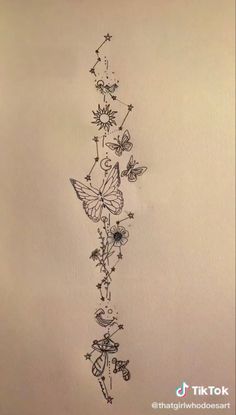 a drawing of flowers and butterflies on a wall