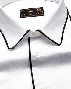 This designer shirt from French Crown is a high-quality garment made from premium Giza cotton, known for its softness, durability, and lustrous appearance. The shirt has a bright white color and features black piping work, which adds a touch of contrast and sophistication to the overall design.This type of shirt is typically tailored to fit the wearer's body, creating a polished and refined look. It can be worn for both formal and casual occasions, depending on how it is styled. Fused collar and Mens Black Shirt, Cotton Shirts For Men, Wedding Suit, Giza, Full Sleeves, White Collar, Wedding Suits, Full Sleeve, White Shirt