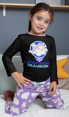 "If your child loves unicorns, she is going to flip over these great shirts! The phrase is \"When I dream, I'm a unicorn.\" This design can go on a child's size hoodie, tee-shirt, or a long-sleeve adult Tee Shirt. The color options are pink, black, and blue. Please message us if you would like different colors or designs. PRODUCT DETAILS ► Printed And Shipped From The USA. ► Double-needle stitched. The shipping address listed on your order is where your shirt will be shipped. Please make sure this information is correct before placing your order. We are not responsible for replacing shirts for free that are returned due to an incorrect address. General Policies *Cancellations accepted within 2 hours of purchase. Due to the personalized nature of this item and limited space in the warehouse Unicorn With Flowers, Unicorn Shirt, Design Websites, Unique Shirt, A Unicorn, Child Love, Girl Power, Go On, Big Kids