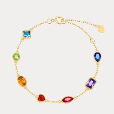 Brighten up any outfit with this fabulous Rainbow Gem Bracelet! Perfect for brightening up any day during back-to-school season, this sparkly piece is sure to get some double-takes! Accessorize with confidence when you rock this colorful bling! DETAILS Plating: 10K Gold Materials: 10K Gold on  S925  Silver,   Cubic Zirconia Length: 7.09"(18cm) Silver Weight: 2.61g Family Bracelets, Cubic Zirconia Bracelet, Gems Bracelet, Rainbow Jewelry, Jewelry Lookbook, Gold Plated Bracelets, Jewelry Manufacturers, Hand Jewelry, Styl Vintage