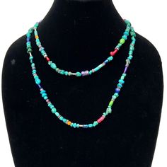 Discover our versatile 44-inch Long Beaded Necklace, a stunning piece inspired by the vibrant Southwest. This necklace can be worn either as a single long strand or stylishly double-wrapped. The necklace features a delightful mix of turquoise beads ranging from 5mm to 10mm in diameter, alongside accent beads including red coral, malachite, amethyst, azurite, and lapis. Sterling silver daisy spacer beads and sterling silver accent beads add an elegant touch to the design. With no clasp required, it's hassle-free to wear and truly colorful, reflecting the rich culture of the Southwest. Elevate your style with this Southwestern-inspired accessory. Each item in our store is truly unique. We do not produce duplicates, and once a piece is sold, it will never be recreated.  50% of the proceeds fr Traditional Turquoise Single Strand Beaded Necklaces, Traditional Turquoise Single Strand Beaded Necklace, Bohemian Single Strand Lariat Beads, Turquoise Lariat Beaded Necklace With Colorful Beads, Turquoise Hand-strung Lariat Beaded Necklace, Turquoise Lariat Beaded Necklace Hand-strung, Turquoise Lariat Beaded Necklace For Festival, Turquoise Long Hand-strung Beaded Necklaces, Artisan Turquoise Double Strand Beaded Necklace