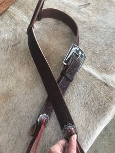 Hand made 1.5" wide headstall with buckle. These headstalls are made in our shop and are made to order. Buckles may vary as inventory changes and new styles are released. They are made from Heavy 14/16 ounce Herman Oak leather. Embossed with the Western Floral, Basketweave, Plain, and soon barbwire. Jermiah Watt Hardware is used and is top quality stainless steel hardware. These headstall get compliments wherever you go and a great using piece of tack. Adjustable Western Concho Belt Buckles, Adjustable Concho Belt Buckles For Western-themed Events, Western Style Adjustable Belts For Western-themed Events, Western Brown Adjustable Belt Buckles, Adjustable Western Belts For Rodeo, Traditional Adjustable Brown Belt Buckles, Adjustable Brown Traditional Belt Buckles, Western Adjustable Belt Buckles For Rodeo, Western Style Adjustable Belt Buckles For Rodeo