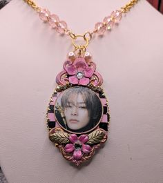 Stray Kids necklace, kpop necklace, Kpop jewelry, Stay Jewelry, SKZ Jewelry, Stray Kids inspired, Stay, I.N., Jeongin inspired, SKZ   Pendant is 2 and half inches long, 1 and half inches wide, Lobster clasp, gold tone chain, shell pink pearls, length 16 or 18 inches, Wood Pendant, painted brass filigree, decoupaged pic of Jeongin, IN Stray Kids, hand painted brass flowers, pink glass beads Stay Jewelry, Skz Jewelry, Kpop Necklace, In Stray Kids, Kpop Jewelry, Brass Flowers, Paint Brass, Brass Filigree, Pink Pearls