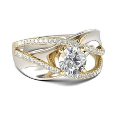 a white and yellow gold ring with diamonds