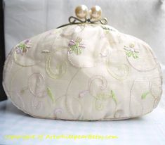 "Ready To Ship. This listing is a elegant embroidery lace Organza beige flowers women frame clutch/ purse with pearl made of 100% cotton. It is perfect for your change, cosmetic,phone or jewelry and also big to fit credit/ id. cards as well. And it is a perfect way to say thank you, happy birthday or \"you are the best of friends\". This purse is made with full attention to detail in my smoke free studio. *Outer material:100% pink cotton cover with white embroidery lace Organza *Lining:100% cott Beige Embroidered Evening Bag For Events, Elegant Embroidered Cream Evening Bag, Elegant Cream Embroidered Evening Bag, Elegant Beige Pouch Coin Purse, Embroidered Cream Clutch Evening Bag, Cream Embroidered Clutch Evening Bag, Elegant Floral Embroidered Pouch Evening Bag, Elegant Floral Embroidery Pouch Evening Bag, Elegant Cream Bag With Floral Embroidery