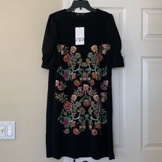 Zara Shift Dress, Size M, New With Tag! Black Floral Embroidery Midi Dress, Black Midi Dress With Floral Embroidery For Fall, Black Floral Embroidery Midi Dress For Fall, Fall Black Midi Dress With Floral Embroidery, Black Floral Print Dress By Zara, Zara Short Sleeve Dresses With Floral Embroidery, Zara Black Dresses With Floral Print, Zara Black Floral Print Dress, Fitted Embroidered Midi Dress By Zara