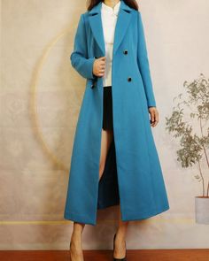 * A long woolen coat, A-line shape, warm and comfortable. * Fully lined with two side pockets, closure with buttons. * Coat dress shape,make you look more taller and slimmer. * Material: out shell - 60% wool, 40% polyester; lining - 100% polyester * Care: dry cleanable * Shop sizing chart FYI ( made according to US sizing. actual body figures, not laying flat clothes measurements) Size XS (US 2, UK 6, German 32, French 34, ) Bust: fits bust around 33.5 inches/85cm Waist: fits waist around 26 inc Fitted Long Wool Coat In Solid Color, Long Wool Coat For Spring, Fitted Long Wool Sweater Coat, Long Wool Coat For Office, Long Sweater Coat For Formal Occasions, Long Wool Coat For Fall, Long Pea Coat With Button Closure, Long Pea Coat For Office, Long Solid Wool Coat With Button Closure