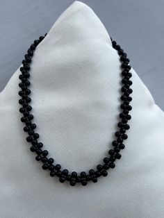 Beautiful and elegant black beaded choker necklace  Necklace length is 16 inches long  With adjustable chain Adjustable Black Pearl Necklace For Party, Elegant Black Pearl Necklace For Evening, Elegant Beaded Choker Necklace, Elegant Black Beaded Chain Choker, Evening Necklace With Polished Beads, Single Strand Necklace With Round Beads For Evening, Polished Beads Necklace For Evening, Evening Single Strand Necklace With Round Beads, Beaded Black Pearl Necklace For Party