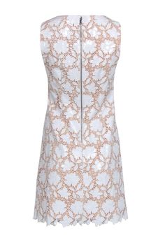 The Alice & Olivia dress is the perfect blend of elegance and edge! This stunningly crafted shift will make heads turn with its white faux leather lace and beige lining. From a bridal shower to an evening dance, you'll be the belle of the ball! Size 4 Shell 100% Polyester Lining 94% Polyester, 6% Elastane Exposed back Sleeveless Bust 34" Waist 32" Shoulder to hem 32" White Lace Dress With Back Zipper, Spring Lace Dress With Back Zipper, Spring Party Lace Dress With Back Zipper, Elegant Spring Lace Dress With Back Zipper, Olivia White, Eyelet Lace Dress, Buy Shoes Online, Eyelet Lace, Leather Lace