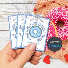 someone is holding three donuts for valentine's day cards with the words, forget forget to forget how awesome they are