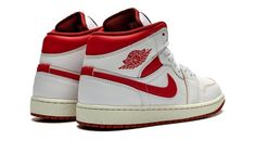 The Air Jordan 1 Mid SE “Dune Red” is a colorway of the casual mid-top shoe with red details.  As classic a look as any for the popular Jordan 1 Mid model, the “Dune Red” features a white leather upper with Dune Red Swoosh branding on either side, and Dune Red “Wings” detailing on the collar.  The deep red hue also appears on the collar underlay, as well as on the Jumpman and “Air” branding on the Sail-colored tongue tag.  Underfoot, a Sail rubber midsole and a red rubber outsole complete the de Mid Top Shoes, Red Jordans, Air Jordan 1 Mid Se, Red Details, Jordan 1s, January 20, Mid Top, Air Jordan 1 Mid, The Dunes