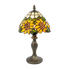 a table lamp with a yellow flower on it