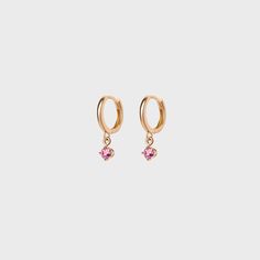 Elevate your style with our new gemstone round charm earrings. Create the perfect stack with our charm hoop collection. Single Pink 14k Gold Earring, Everyday Rose Gold Earrings With Birthstone, Rose Gold Birthstone Earrings For Everyday, Rose Gold Pink Sapphire Earrings For Gift, Rose Gold Pink Sapphire Earrings As Gift, Elegant 14k Gold Hoop Earrings With Charms, 14k Gold Birthstone Hoop Earrings, 14k Gold Round Charm Earrings, 14k Gold Round Earrings With Charms