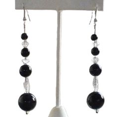 1920s pierced black dangling earrings. Made from smooth, round, Persian black Onyx beads and faceted crystal roundels. Strung on a fine sterling silver chain. The original wires have been replaced with modern sterling silver fittings. See the matching necklace we have listed. 65 x 13 mm widest bead.  Love it ♡  Get it ☆  Get Lucky 💋 Vintage Get Lucky, Onyx Earrings, Onyx Bead, Dangling Earrings, Delicate Details, Faceted Crystal, Matching Necklaces, Miami Fl, Sterling Silver Chain