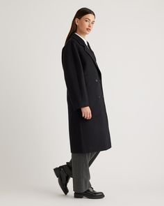 A total classic. Made from Italian Melton wool we sourced exclusively from a prestigious Italian mill, this coat is the finish your cold weather look needs. Think velvety smooth texture and graceful drape on a timeless double-breasted silhouette with a notched lapel. And that relaxed fit? Translates as 100% effortless.  | Quince | Women's Italian Wool Double-Breasted Slouch Coat in Black, Size Small Classic Structured Double-breasted Pea Coat, Classic Long Peacoat With Double-breasted Buttons, Classic Long Peacoat With Double-breasted Fastening, Elegant Double-breasted Peacoat For Work, Classic Structured Double-breasted Wool Coat, Structured Double-breasted Wool Coat For Business, Solid Wool Coat With Double Button Closure For Work, Timeless Double-breasted Winter Pea Coat, Timeless Wool Coat With Double Button Closure For Winter