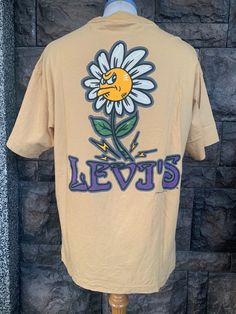 "Vintage 90s Levi's Graphic Art T-Shirt Item Condition: Pre-Owned (Used) condition. please see pictures Size on Tag: L, Please check measurement Tag : Levis ------------ Measurement: ------------- Chest (Pit to Pit) 22\" Length 27.5\" Shipping: Worldwide ---------- Standard Shipping 14-30 Days Express 5-8 Days I can do combined shipping +Add USD 5 shipping for each additional items!" Vintage T-shirt For Spring Streetwear, 90s Style Graphic Print T-shirt For Spring, Vintage Style T-shirt For Spring Streetwear, Levi's, Picture Sizes, Mens Graphic Tee, Vintage Shirts, Graphic Art, Tee Shirts