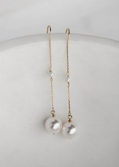 Cecile is a dainty set of pearl drop earrings featuring light-catching Swarovski pearl drops suspended from a fine chain. These delicate details whisper sophistication and style which you will love to wear after your wedding day. * DETAILS * > Designed and handmade in Australia. Worldwide shipping > Swarovski pearls, gold or silver plated settings > Measurement: 65mm * READY TO SHIP * The Cecile earrings are ready to ship. Please allow 5-7 business days for processing plus delivery time Jas Wedding, Embellished Veil, Pearl Bridal Comb, Bohemian Weddings, Bridal Floral Headpiece, Lehenga Red, Wedding Headpieces, Bridal Earrings Pearl, Silver Earrings Handmade