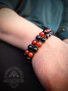 Carnelian & Black Obsidian Gemstone Bracelet - Etsy Spiritual Black Friendship Bracelets, Black Beaded 8mm Jewelry For Friendship, Black Carnelian Jewelry For Gifts, Black Carnelian Jewelry With Natural Stones, Handmade Black Carnelian Jewelry, Handmade Black Obsidian Beaded Bracelets, Black Agate Bracelets For Healing, Black Hand-wrapped Bracelets, Black Agate Beaded Bracelet Gift