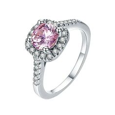 a pink diamond ring with white diamonds on the sides and an oval center stone in the middle