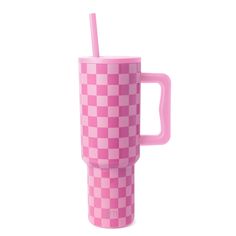 a pink checkered cup with a straw sticking out of it's side, on a white background