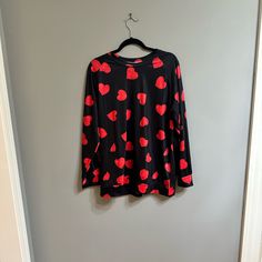 Long Sleeve Heart Shirt. Never Worn. Red Hearts B11 Black Long Sleeve Tops With Heart Graphic, Black Long Sleeve Top With Heart Graphic, Fitted Long Sleeve Tops For Valentine's Day, Black Heart Print Tops For Fall, Fitted Red Heart-shaped Top, Fitted Red Tops With Heart Print, Fitted Red Heart Print Top, Fitted Red Top With Heart Print, Red Tops With Heart Graphic For Fall