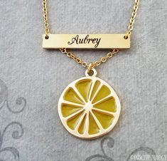 Lemon Necklace Lemon Jewelry Lemon Charm Necklace STAINLESS STEEL Bar Necklace Personalized Jewelry Name Necklace Custom Engraved Necklace This listing is for a lemon necklace with an engraved bar personalized with a name. Just send us a name in a note during checkout. Character limit of 15, including spaces. You can pay to have both sides engraved by using the drop-down menu. See the secondary photos for charm scale and font options. Want something special engraved? Just ask! Please see the sec Trendy Personalized Yellow Jewelry, Trendy Yellow Necklace With Adjustable Chain, Nickel-free Yellow Pendant Necklace, Yellow Pendant Necklace Nickel Free, Yellow Charm Necklace With Lobster Clasp For Gift, Yellow Charm Necklace With Adjustable Chain As Gift, Personalized Yellow Jewelry For Gifts, Trendy Yellow Jewelry With Adjustable Chain, Personalized Yellow Jewelry As Gift