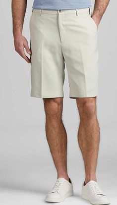 These performance shorts from the Traveler Collection were made for warm-weather fun. The fabric features a special finish that resists stains (great for backyard bbqs) while keeping wrinkles to a minimum. Adjustable waistband. Tailored Fit. Flat front. 100% polyester. 10" inseam. Machine washable. Imported. * 100% POLYESTER * TAILORED * IMPORTED FROM VIETNAM * ADJUSTABLE WAISTBAND Spring Bermuda Athletic Shorts With Built-in Shorts, Summer Sports Bermuda Shorts, Casual Spring Golf Bottoms, Fitted Golf Shorts For Spring, Cotton Golf Bottoms With Built-in Shorts, Sporty Golf Bottoms For Spring, Moisture-wicking Short Bottoms For Spring, Spring Shorts With 4-way Stretch And Short Inseam, Cotton Bottoms With Built-in Shorts For Golf