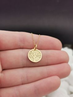 "Dainty 14k Solid Gold Tree of Life Necklace, Personalized Tree of Life Pendant, Gold Tree Necklace, Custom Tree of Life Necklace, Yggdrasil 14k Solid Gold Choose What Size You Want the Pendant Using The Second Option Box Photos Are For The 0.5 inch Diameter Pendant ♥ Material of pendant and chain: Solid Gold 14K ♥ Packaging: All of our jewelry is beautifully boxed and ready for gifting For more personalized designs take a look here: ♥ www.etsy.com/listing/631444472 ♥ www.etsy.com/listing/645292 Tree Of Life Necklace Gold, Compass Jewelry, Gold Pendant Jewelry, Gold Tree, Gold Bee, Bee Pendant, Bee Necklace, Tree Necklace, Tree Of Life Necklace