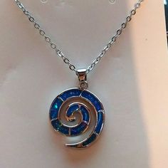 Silver And Sparkly Blue Spiral Necklace On 18 Inch Chain With 2 Inch Extender Brand New. Blue Spiral Necklace For Gift, Blue Spiral Sterling Silver Jewelry, Necklaces Star, Blue Necklaces, Blue Spiral, Spiral Necklace, Spike Necklace, Unicorn Necklace, Star Of David Pendant