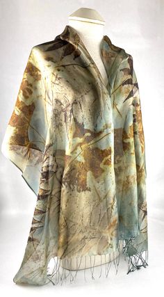 Unique, one of a kind, woman's fashion accessory is this lightweight hand dyed and eco printed shawl/scarf. This mesh silk drinks in the color of blues and natural, earthy browns. Eco printing uses real leaves and organic material. Sophisticated for any special occasion, organic in design. Perfect for that Art to Wear gift. Order today! This beautiful shawl/scarf measures approximately 21" x 70" plus a 3" fringe. Dry clean only Free Shipping in the USA! I so appreciate your support and am always Eco Print Fabric, Eco Fashion Design, Eco Printing Textiles, Hand Dyed Clothing, Wild Women Sisterhood, Pagan Clothing, Creative Clothing, Eco Print, Real Leaves