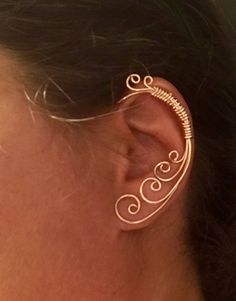 Bound to be Swirls, Vine earring, Jewelry, Ear Cuff, Vine Jewelry, ear jewelry, ear climber, ear wrap, ear jacket, non pierced by WickedlyWired on Etsy https://www.etsy.com/listing/556666014/bound-to-be-swirls-vine-earring-jewelry Elegant Adjustable Wire Wrapped Ear Climbers, Elegant Gold Wire Wrapped Cartilage Earrings, Elegant Gold Wire-wrapped Ear Cuff, Elegant Gold Wire Wrapped Ear Cuff, Elegant Wire Wrapped Cartilage Earrings For Gift, Elegant Adjustable Spiral Wrap Earrings, Spiral Ear Cuff, Elegant Spiral Ear Cuff, Elegant Spiral Single Ear Cuff