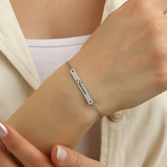 ✅ Personalization: This beautiful bracelet features a classic font that creates a beautiful, perfectly balanced look when worn. Simply select your desired engraving and our skilled craftsmen will take care of every detail, creating a personalized bracelet that you can proudly wear yourself or give as a gift. ✅ Dimensions: plate: 4 mm x 24 mm, length: 16 + 3 cm adjustable, ✅ PERFECT GIFT IDEA: If you are looking for an original gift, this exclusive bracelet is just the thing. No matter whether it Elegant Stainless Steel Bracelet With Custom Name, Trendy Personalized Name Bracelet For Mother's Day, Dainty Customizable Silver Bracelet, Elegant Stainless Steel Name Bracelet, Elegant Stainless Steel Nameplate Bracelet, Minimalist Stainless Steel Name Bracelet, Customizable Name Bracelet For Everyday Wear, Customizable Everyday Name Bracelet, Elegant Silver Name Bracelet For Friendship