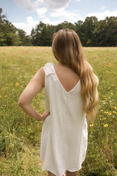 This is a white sleeveless v neck dress with a ruffle detail on the shoulder. The model is wearing a size small Sleeveless V Neck Dress, White Sleeveless, The Model, V Neck Dress, Clothes For Sale, Fashion Inspiration, Spring Fashion, Neck Dress, Winter Fashion