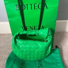 Brand New Bottega Bag Straight From Italy In The Hottest Green Of The Season .The Best Bag Model , Incredibly Versatile And Easy To Wear , Perfect For Dress Up Or Dress Down, It Will Take You From Brunch To Dinner In Style. Designer Green Handheld Bag, Evening Satchel Bag With Intrecciato Weave, Intrecciato Weave Pouch Bag, Designer Shoulder Bag With Rolled Handles For Errands, Green Clutch Bag For Errands, Designer Formal Shoulder Bag With Rolled Handles, Green Satchel Bag With Intrecciato Weave, Evening Pouch Bag With Rolled Handles, Luxury Green Bag With Rolled Handles