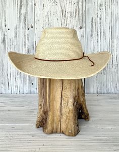 Reata style hat with rust shade suede lace band. 4" brim, 5.75" crown. Pick your size. Pick your size Country Style Straw Hat With Flat Bill For Outdoor, Fitted Country Hats For Outdoor, Flat Bill Sun Hat For Summer Rodeo, Summer Straw Hat With Flat Bill For Ranch, Western Style Adjustable Panama Hat With Flat Bill, Adjustable Flat Bill Hat For Ranch, Flat Bill Hats For Ranch In Summer, Adjustable Natural Flat Bill Hat, Summer Ranch Hat With Flat Bill