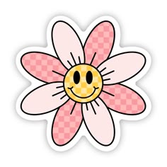 a pink flower with a smiley face on it