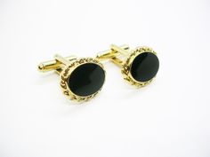 Classic vintage Cufflinks, black Front, gold tone Metal. Size: 14 by 18 mm. Wedding Jewelry, Formal Wear, Black Tie Event, Shirt Accessory. Classic Black Cufflinks For Formal Occasions, Classic Black Formal Cufflinks, Black Classic Wedding Cufflinks, Classic Black Wedding Cufflinks, Elegant Black Cufflinks For Wedding, Gold Cufflinks For Black Tie Events, Elegant Black Wedding Cufflinks, Classic Gold Cufflinks For Party, Classic Gold Formal Cufflinks