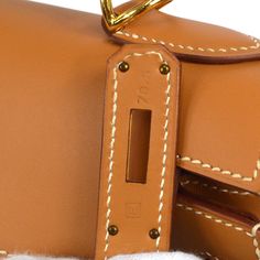 HERMES KELLY 28 SELLIER 2way Shoulder Handbag Natural Veau Chamonix Pocket Outside: - Inside: Zipper Pocket*1, Pocket*2 Size(Inch) W 11.0 x H 8.3 x D 4.3 ' Handle Drop. 3.9 ' Strap Drop. 16.9 ' Size(cm) W 28.0 x H 21.0 x D 11.0 cm Handle Drop. 10.0 cm Strap Drop. 43.0 cm Color / Material Natural / Veau Chamonix Luxury Saddle Bag With Branded Hardware For Daily Use, Luxury Saddle Bag With Top Handle, Luxury Rectangular Saddle Bag With Branded Hardware, Designer Saddle Shoulder Bag With Palladium Hardware, Designer Satchel Saddle Bag With Palladium Hardware, Designer Saddle Satchel Bag With Palladium Hardware, Designer Rectangular Saddle Bag With Detachable Handle, Luxury Brown Saddle Bag With Branded Hardware, Designer Saddle Bag For Business