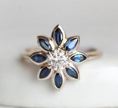 Blue Sapphire And Diamond Ring, Sapphire Diamond Flower Ring – Capucinne Sapphire Flower Ring, Blue Engagement Ring, Floral Engagement Ring, Flower Engagement Ring, Solid Gold Band, Sapphire Diamond Ring, Blue Sapphire Rings, Sapphire Engagement, Marquise Cut