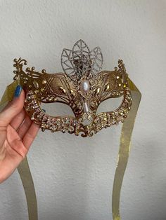 Handmade golden carnival party with rhinestones mask unisex venetian mask A unique item for Carnival party or Halloween party! Golden Mask  The mask is unisex. The base is plastic, decorated with rhinestone chain, rhinestones. One size. Handmade. Unique. Tied behind the head with satin ribbon. Decor does not interfere with the view. Perfect for a carnival party, birthday party, Pride or photoshoot. CHIMERA - IT IS ALWAYS BEAUTIFUL PACKAGING🎁 SO IT CAN BE A GOOD GIFT FOR AN IMPORTANT PERSON❤️🔥 Gold Masks For Halloween Costume Party, Fantasy Gold Masks And Prosthetics For Halloween, Gold Venetian Masquerade Mask For Halloween, Gold Mardi Gras Costume Accessories, Venetian Gold Masquerade Mask For Halloween, Gold Costume Masks For Halloween, Gold Venetian Mask For Halloween, Elegant Gold Masquerade Mask As Gift, Gold Eye Mask For Costume Party