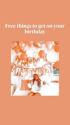 a woman sitting in front of balloons with the words free things to get on your birthday