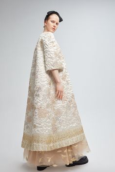 Description Gold A-line, Long dress Loose, Three-quarter sleeves Open neckline Brocade, Tulle, Lace Dry Clean Made in Spain SKU 21-12/21-08 Luxury Brocade Dress With Sheer Dupatta, Tulle Layered Dress, Herringbone Embroidery, Brocade Coat, Billionaire Boy, Layered Dress, Embroidered Tulle, Shades Of Gold, Layer Dress