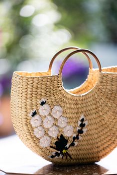 Natural straw tote with half-moon silhouette, wooden handle and embroidered pink and green floral design. The perfect summer day bag that goes with everything, she can be worn a beach bag or handbag. Dimensions: 15" W x 10" H Crochet Hand Bags, Perfect Summer Day, Green Floral Design, Moon Silhouette, Bags Patterns, Husband Shirts, Straw Tote, Day Bag, Summer Hats