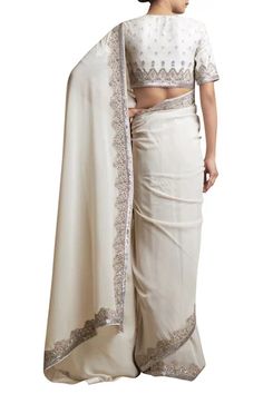 Shop for Sue Mue Off White Saree With Embellished Border And Blouse for Women Online at Aza Fashions Elegant Embroidered Pre-draped Georgette Saree, Elegant Pre-draped Saree With Embroidered Border For Wedding, Elegant Semi-stitched Pre-draped Saree With Embroidered Border, Elegant Georgette Blouse With Intricate Embroidery, Elegant Georgette Pre-draped Saree With Embroidered Border, Fitted Georgette Embroidered Fabric For Formal Wear, Fitted Georgette Embroidered Fabric For Formal Occasions, Formal Saree With Embroidered Border, Fitted Embroidered Georgette Fabric For Formal Wear