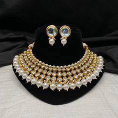 Sabyasachi  inspired Jadau Kundan Choker with Beautiful Heavy Jhumki , Bridal Set Raj Wada Haar/ Pearl Choker  This product is handmade & hence the product can be non-uniform & vary in color & texture. If u are looking like a Princesses in your Wedding then go with this Grand Necklace   Fashion Empire gives you new look, Made of high quality material(s).  This is very Designer Necklace Set, Its A Choice Of Many Bollywood Celebrities.  Trust me, it is more Beautiful in Real another the Picture  This beautiful Set which is light in weight. The stones used are of high quality and the alloy used is led free. Designed By Master Craftsmen. Based On Indian beautiful Jewelry with a touch of the a contemporary art. Earrings Post Back Wire Is Very Thin, Soft And Properly Located In Center So It Fits Kundan Jhumkas For Festivals, Gold Sets With Meenakari For Designer Wear, Gold Sets With Meenakari Detailing, Festive Kundan Necklace With Meenakari For Designer Wear, Gold Kundan Necklace For Designer Festivals Wear, Elegant Meenakari Choli For Festivals, Designer Kundan Necklace With Zari For Festivals, Bollywood Style Kundan Necklace With Meenakari, Heavy Bollywood Jhumkas For Designer Wear