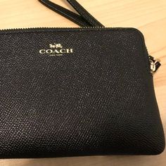 Coach Brand Wallet Clutch New With Tags Leather Coach Purse Wristlet Wallet Approx 6 3/8" X 4" X .5" Black Pebble Pattern On The Outside Black Fabric Inside 1 Main Compartments With 1 Tiny Side Compartments Coach Clutch Wallet, Coach Evening Pouch Clutch, Coach Evening Clutch Wallet, Coach Elegant Wallet With Cell Phone Pocket, Coach Clutch Wallet With Removable Pouch, Elegant Coach Wallet With Cell Phone Pocket, Coach Formal Pouch Wallet, Classic Formal Wristlet With Zipper Closure, Formal Wristlet With Zipper Pouch